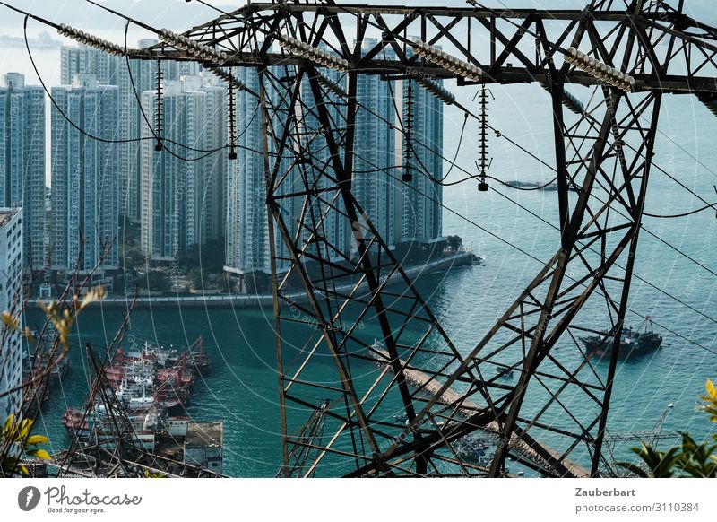 Energy Energy industry Electricity pylon High voltage power line Insulator Ocean Hongkong Port City Skyline High-rise Harbour Navigation Sharp-edged Large Blue