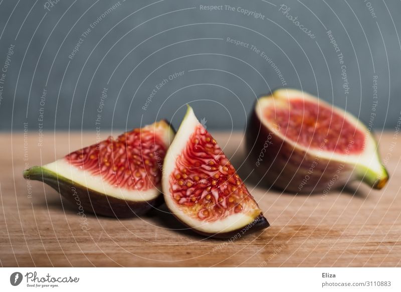 Sliced fig on wood Fig Delicious Juicy Fruit flesh fruit salubriously Nutrition Red
