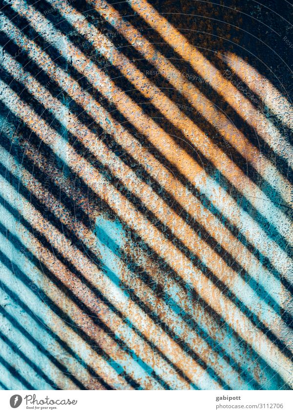 diagonally striped by the shadow Facade Old Town Blue Brown Gold Rust Striped Metal Industrial Photography Industrial plant Colour photo Exterior shot Detail