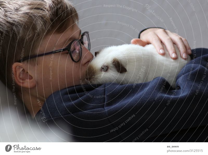 cuddling Boy (child) Infancy Youth (Young adults) Life 13 - 18 years Eyeglasses Blonde Animal Pet Pelt Guinea pig To hold on Kissing Authentic Cute Blue Gray