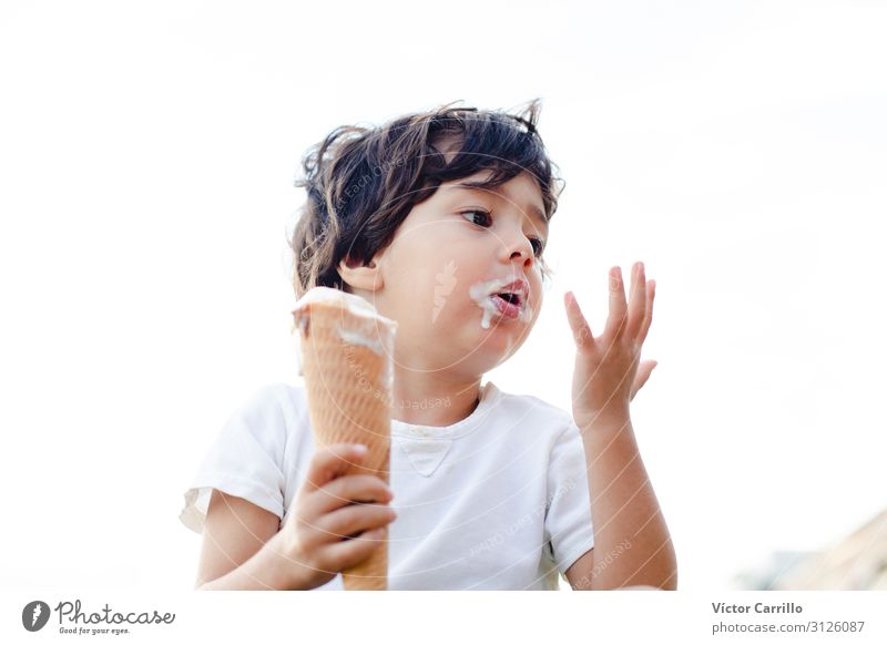 A little boy eating an ice cream Lifestyle Human being Child Toddler 1 1 - 3 years Authentic Natural Cute Original Positive Exterior shot Copy Space left