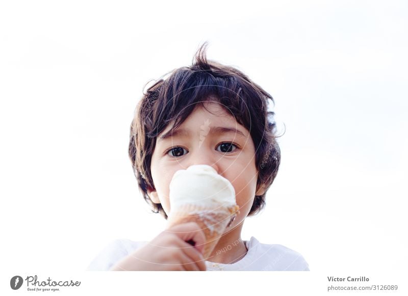 A little boy eating an ice cream Lifestyle Human being Child Toddler 1 1 - 3 years Emotions Joy Optimism Determination Acceptance Truth Discover Relaxation