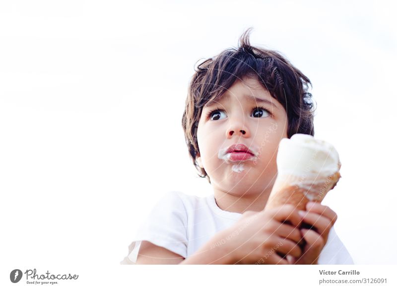 A little boy eating an ice cream Masculine Child Toddler Infancy 1 - 3 years Esthetic Cool (slang) Beautiful Natural Truth Honest Curiosity Hope Colour photo