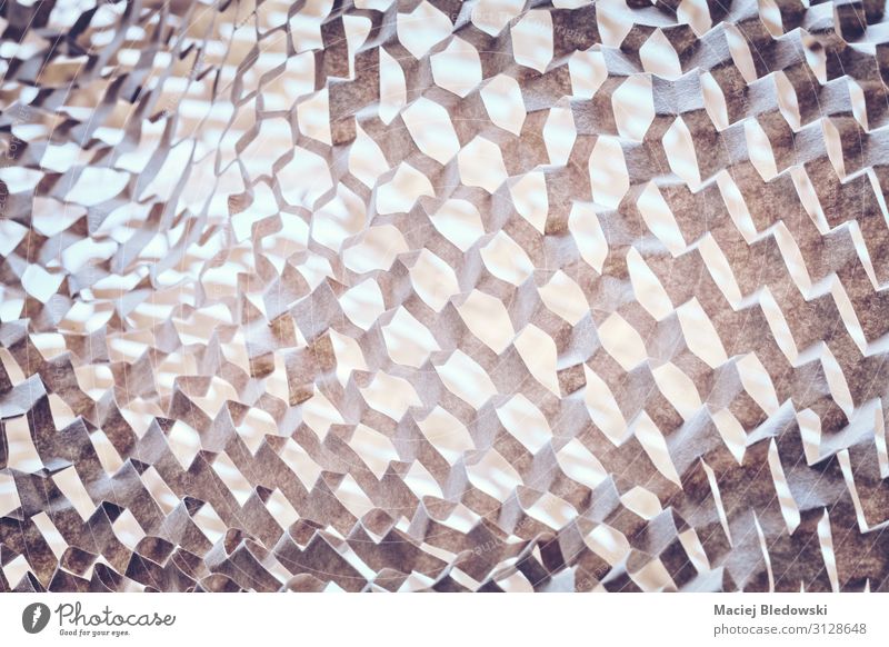 Abstract background made of perforated brown paper. Wallpaper Paper Retro Uniqueness Effect undulated spatial Illustration filtered Three-dimensional eco