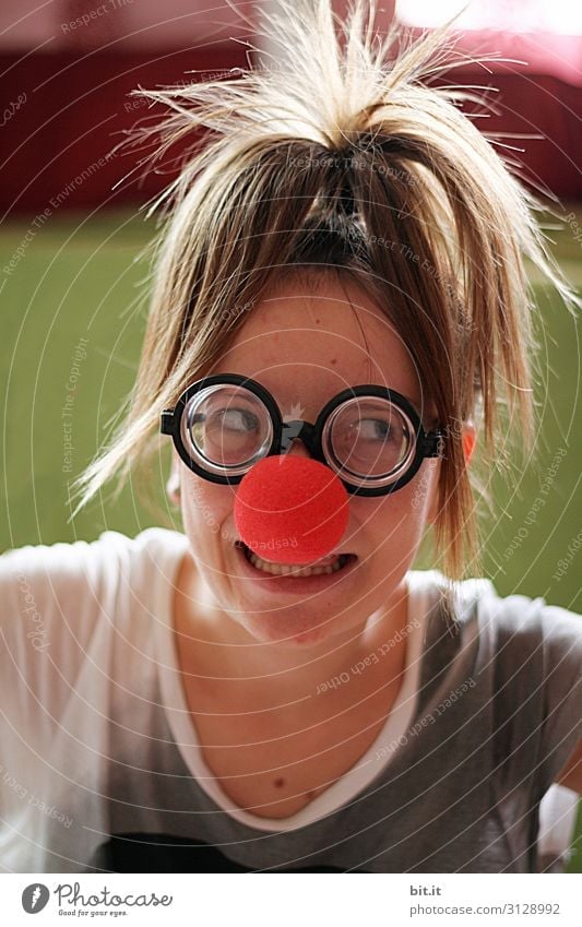 Girl with horn-rimmed glasses and red clown nose Playing Children's game Party Feasts & Celebrations Carnival Birthday Human being Feminine girl Young woman