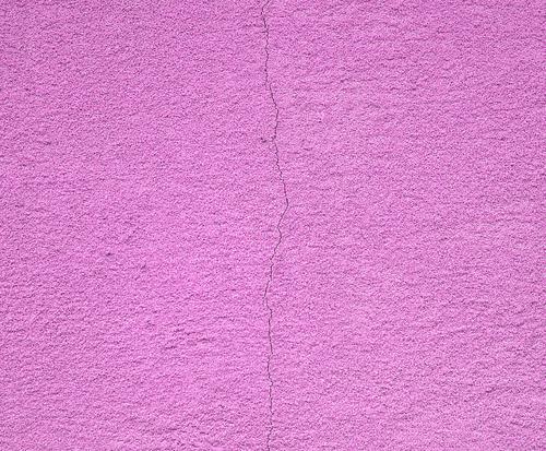 purple cement wall with a crack Design Building Architecture Stone Concrete Old Natural Retro Pink Colour Torn background Cement construction Crack & Rip & Tear