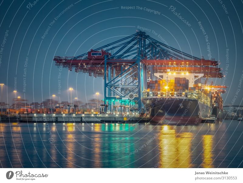 Container ship in the port of Hamburg at night Industry Trade Capital city Port City Harbour Bridge Manmade structures Means of transport Navigation