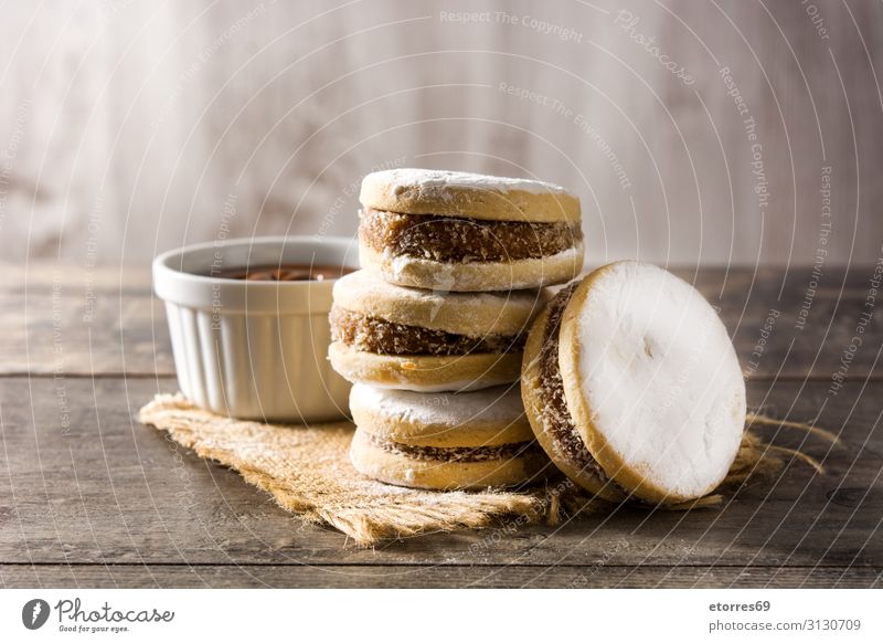 Traditional Argentinian alfajores with dulce de leche and sugar Sweet Cookie Latin American South American argentinian Peruvian colombian Dessert Caramel