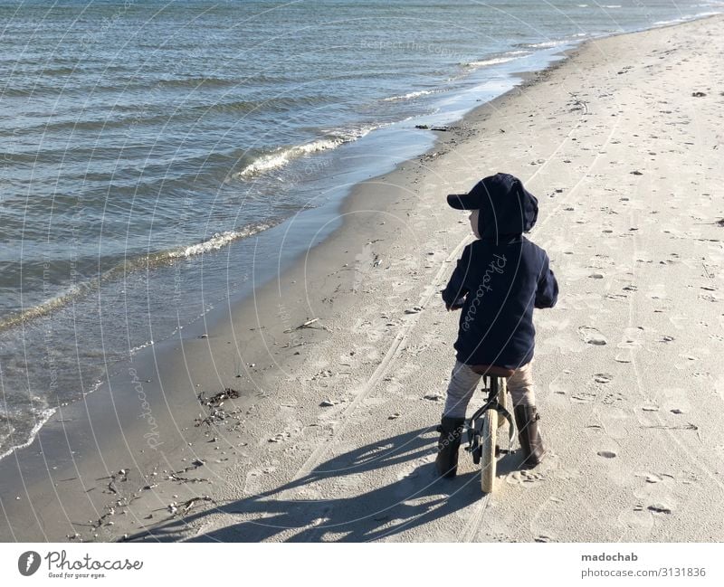 Little boy with bicycle on the beach with sea view Harmonious Well-being Contentment Vacation & Travel Tourism Trip Far-off places Freedom Expedition