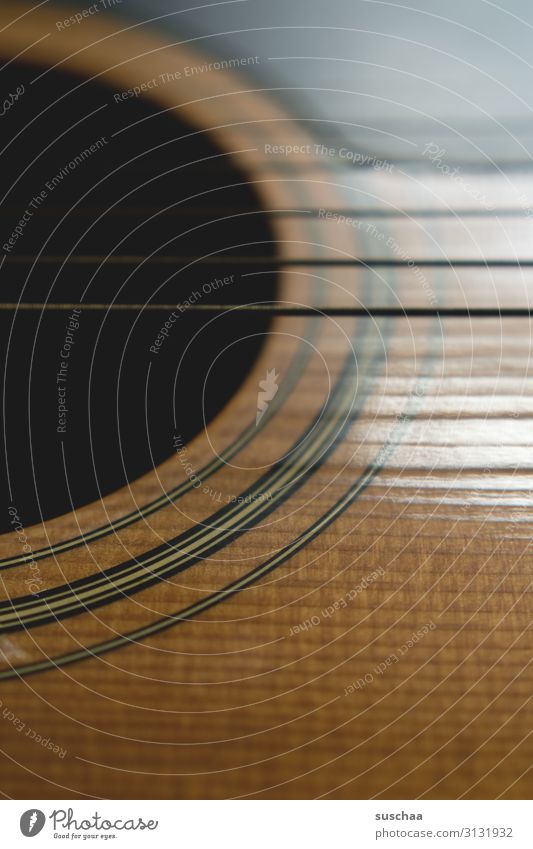 cutout guitar Guitar Guitar string Music Musical instrument Musical instrument string Leisure and hobbies Make music Wood Sound Tone Close-up Detail Musician