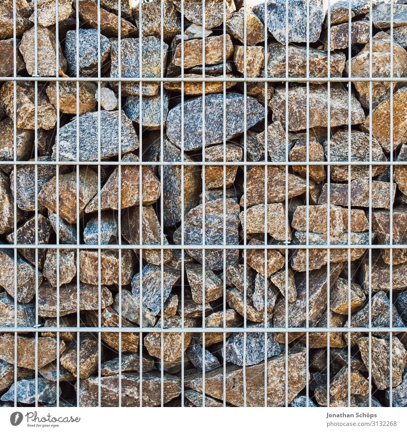 Stone wall with metal grid Wall (barrier) Wall (building) Esthetic Background picture Garden Border Metal Real estate Boundary line Structures and shapes