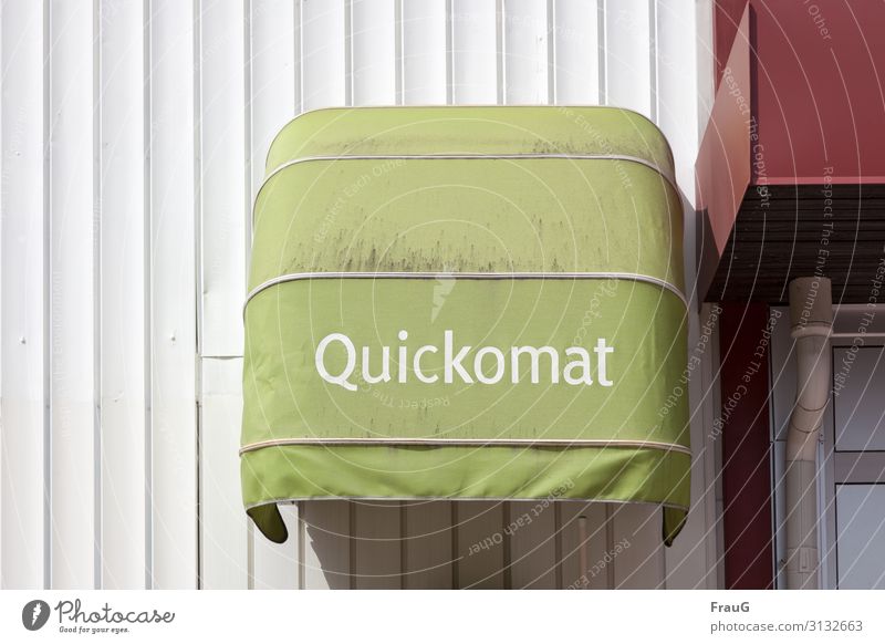 Quickomat Building Facade Wall (building) Disguised Sun blind Protection Weather protection frowzy Green writing Downspout Shadow