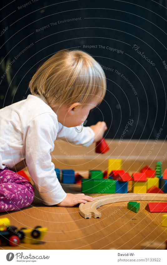 Better toys made of wood than plastic Playing Living or residing Flat (apartment) Children's room Human being Feminine Toddler Girl Infancy Life Hand Fingers 1