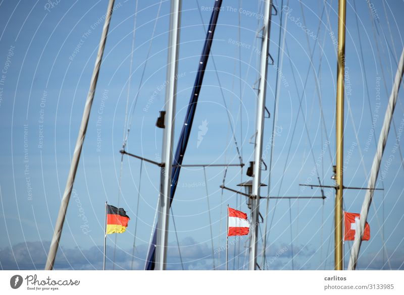 Flags in the wind II Germany German Flag Austria Switzerland triangle Lake Constance submerged objects Harbour Flagpole Mast Tourism
