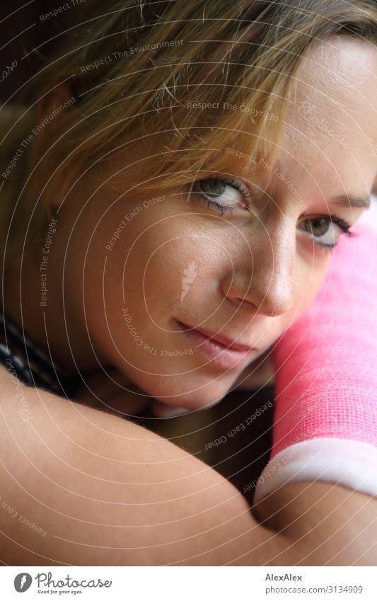 Portrait of a young woman with arm in plaster Style pretty Healthy Sportsperson Young woman Youth (Young adults) Face Arm 18 - 30 years Adults Blonde