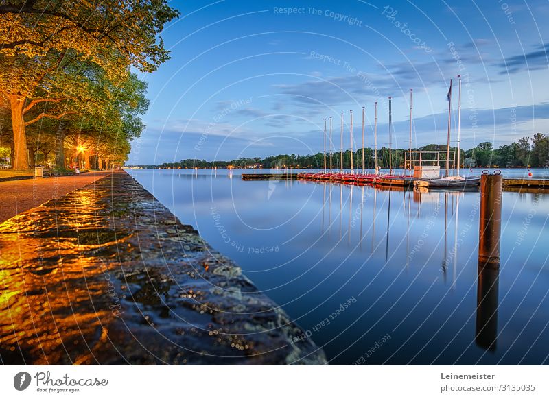 Maschsee lake in Hannover in the evening Evening boats blue hour tranquillity Summer windless