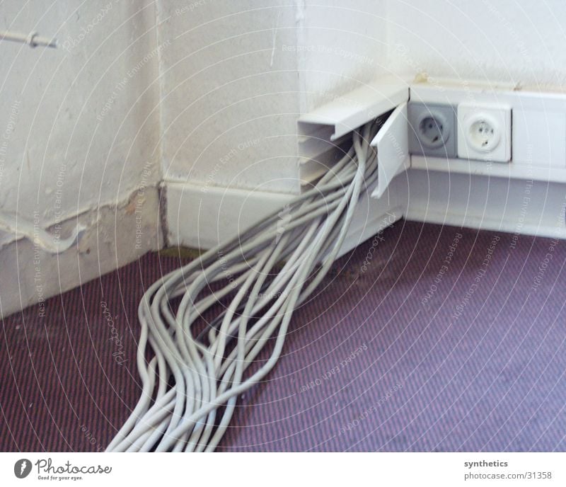 tangled cables Cable Wall (building) Electrical equipment Technology cable duct Sockets!