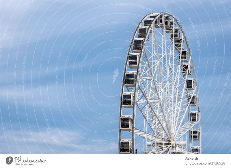 Panoramic wheel on a light blue sky background. Joy Beautiful Relaxation Vacation & Travel Tourism Sightseeing Summer Entertainment Landscape Sky Park Skyline