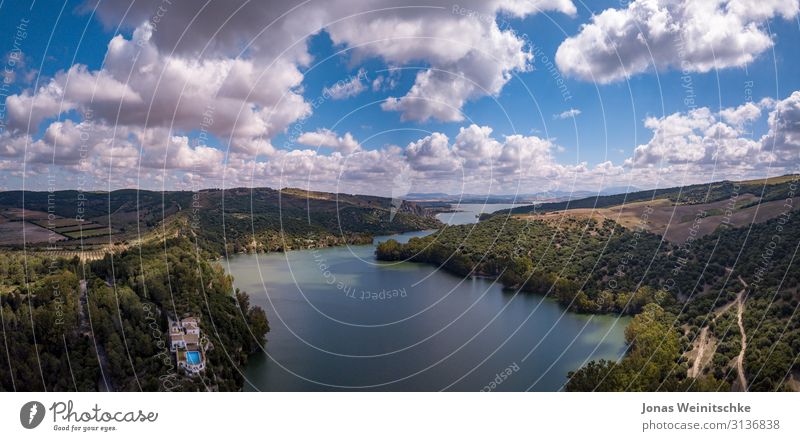 Panorama of a reservoir in Andalusia Climbing Mountaineering Hiking Landscape Water Sky Beautiful weather Forest Hill Canyon River bank Walking Contentment