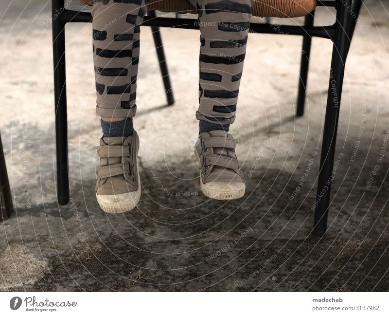 Too short Lifestyle Human being Child Toddler Legs Feet 1 Sit Wait Trashy Loneliness Break Footwear Dangle Chair Colour photo Subdued colour Exterior shot