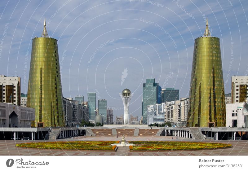 Retro-futuristic skyline in Nur-Sultan Architecture astana nur-sultan Kazakhstan Town Downtown Deserted Tower Tourist Attraction Landmark Monument Glittering