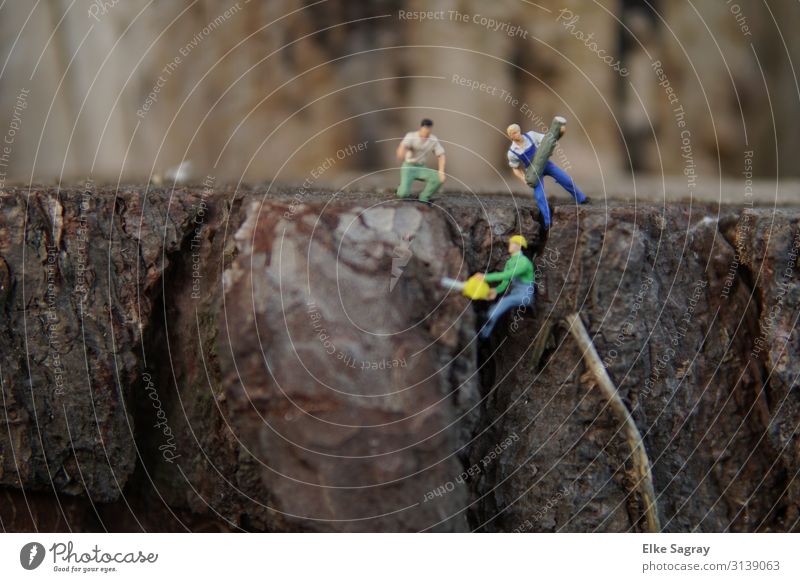 Miniature Worlds Woodworker Small Men at Work Masculine Work and employment Muscular Blue Brown Multicoloured Colour photo Exterior shot Close-up