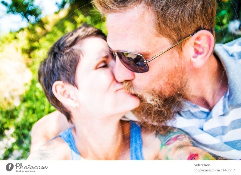 love| kissing couple Man Woman Affection Sunglasses Exterior shot Skin Adults Family & Relations Mouth Lips Nose Face Contentment Trust Safety (feeling of)