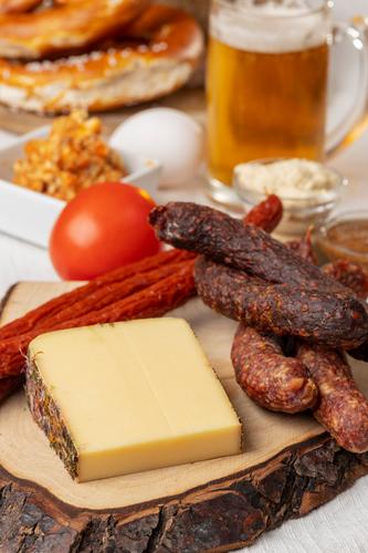 snack Meat Sausage Beer Oktoberfest Barbecue (apparatus) Wood Delicious Brown Red Eating supervision Beer mug Germany Pretzel Spread Glass Mustard Egg