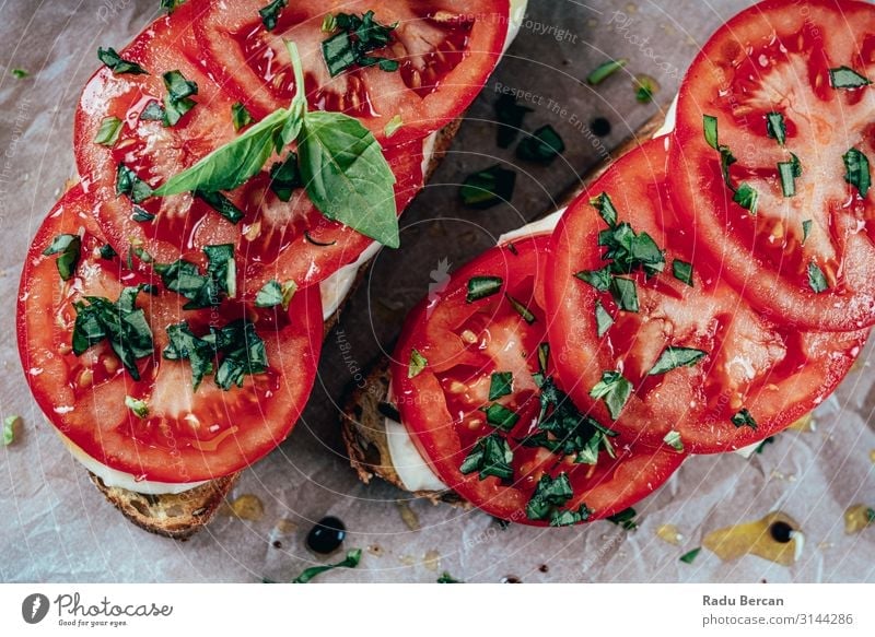 Caprese Toast With Mozzarella, Tomatoes And Basil Healthy Sandwich Bread Snack Appetizer bruschetta Meal Food Vegetarian diet Dinner Italian Cooking Diet