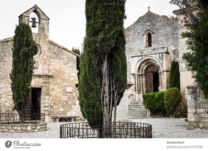 Monastery courtyard in Provence Tree Cypress France Church Manmade structures Bell tower Church bell Stairs Facade door Courtyard Think Simple Historic Brown
