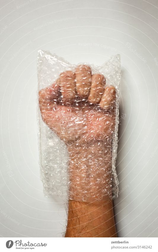 fist Fist Concentrate Thumb Fingers Gesture Hand Man Human being Paper bag Plastic bag Packaging Forefinger Indicate Bubble Anger slowed Caution Protection