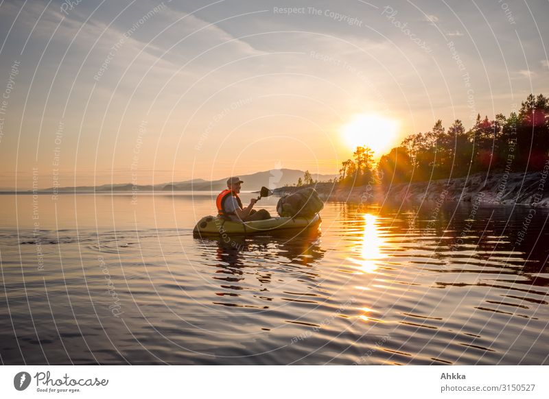 Kayaker backlit in sunset on mirror smooth lake in mountains Freedom Vacation & Travel Adventure Independence Back-light Sun Sunset Scandinavia Nature Twilight