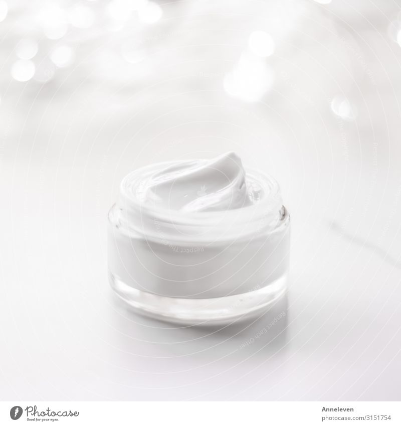Facial cream moisturizer jar on holiday glitter background, moisturizing skin care as lifting emulsion, anti-age cosmetics for luxury beauty skincare brand