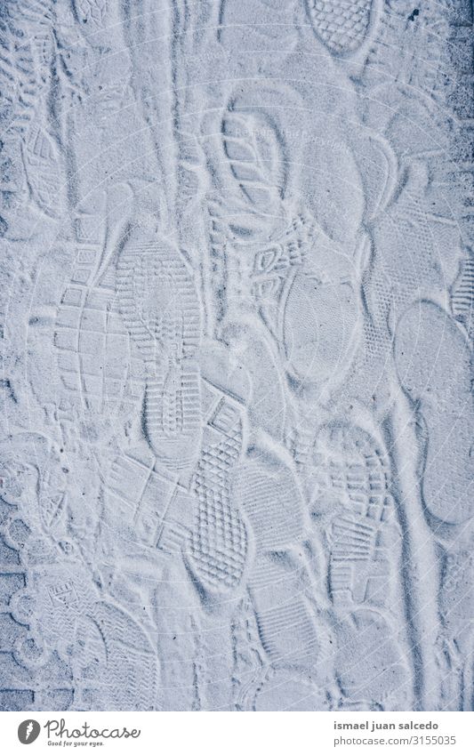 footprints on the white sand on the ground Footprint Sand White Gray Street Sidewalk Pavement Ground land Footpath Exterior shot Grit Consistency Abstract