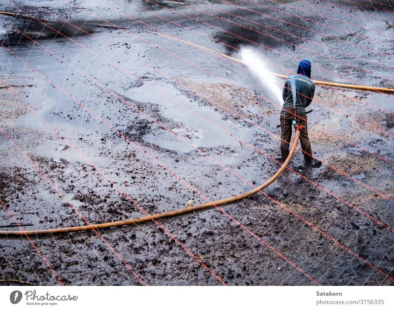 Cleaning the mud at the bottom of pond Work and employment Agriculture Forestry Human being Man Adults 1 Nature Landscape Drops of water Pond Rubber boots