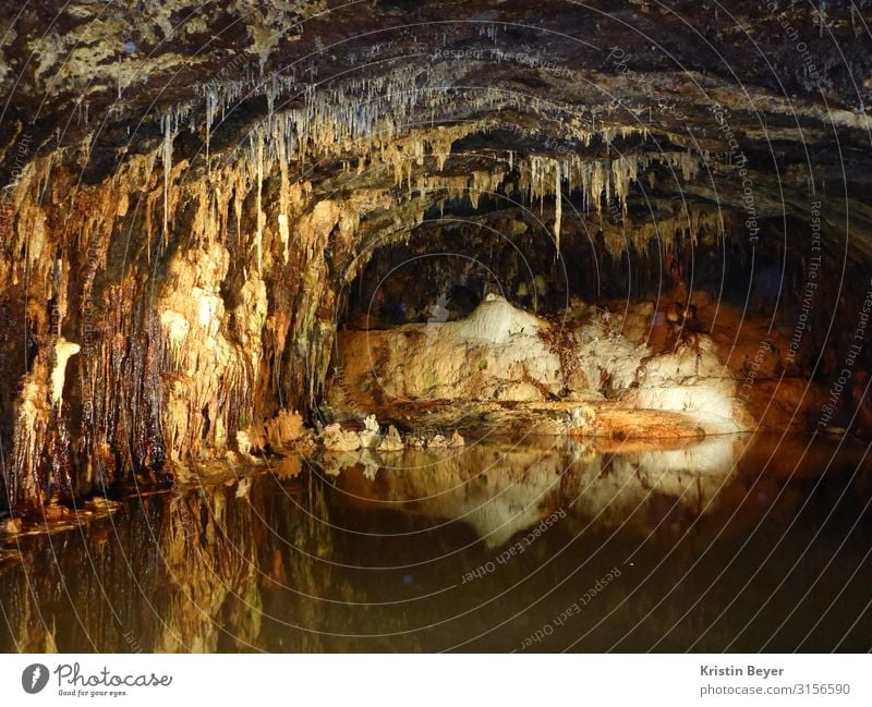 stalactite cave Calm Environment Nature Elements Water Lake Cave Tourist Attraction fairy grotto Stone Glittering Old Dark Historic Natural Moody Interest