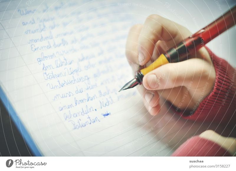 written | homework Child Schoolchild Study Homework dictate Lessons Reading Write Education German Handwriting cursive Fingers Fountain pen exercise book