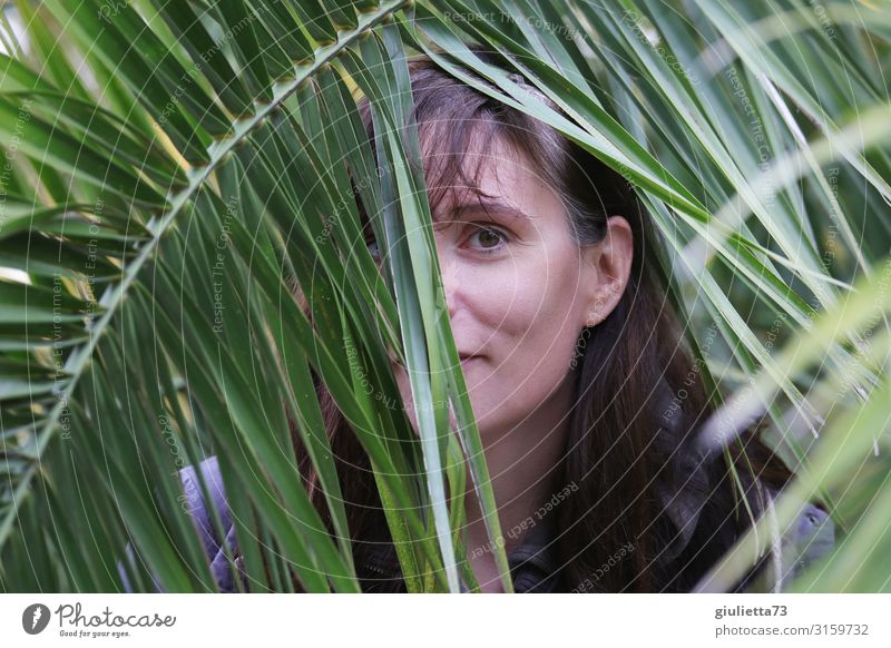 A little shy... | UT HH19 Young woman Youth (Young adults) Woman Adults Life Human being 30 - 45 years Foliage plant Exotic Palm tree Palm frond Observe Looking