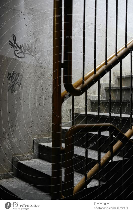 upward Underground garage Stairs Concrete Metal Graffiti Line Dirty Dark Yellow Gray Black White Emotions Claustrophobia Banister Colour photo Interior shot