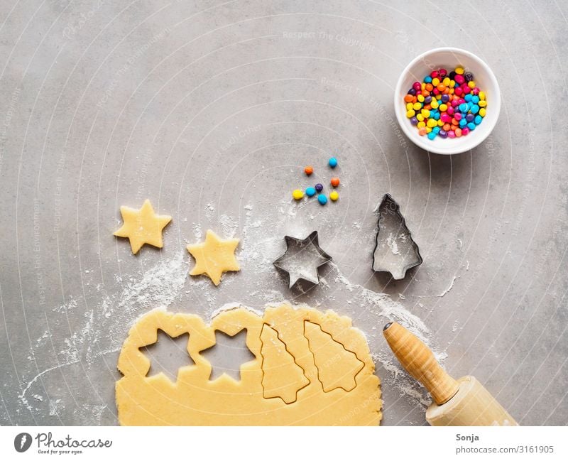 Christmas biscuits baked with colorful sprinkles Food Dough Baked goods raw dough Cookie Crockery Bowl Rolling pin Lifestyle Christmas & Advent To enjoy