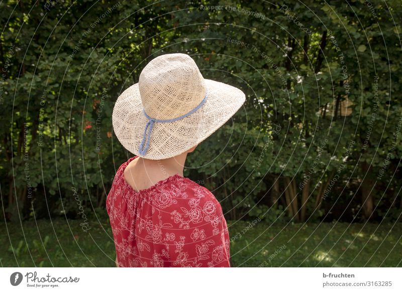 Woman with a sun hat in the park Contentment Relaxation Calm Adults Head Back 1 Human being Nature Summer Plant Tree Bushes Garden Park Hat Observe To enjoy