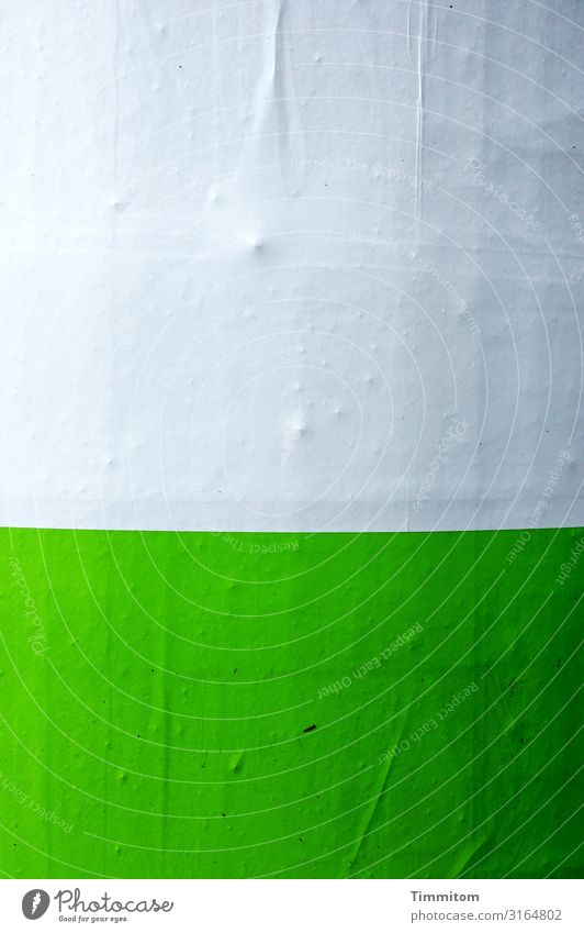 Green and white on an advertising pillar Paper White Colour photo Design Advertising column round Deserted Exterior shot Poster crease Subsoil