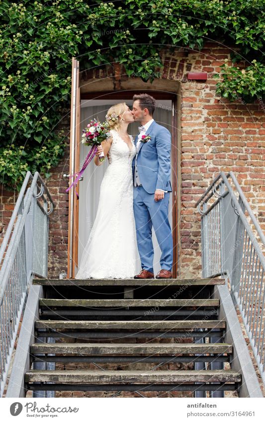the kiss Wedding Masculine Feminine Woman Adults Man Couple Life Body 2 Human being 18 - 30 years Youth (Young adults) Wall (barrier) Wall (building) Stairs