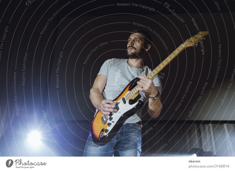guitarist performs at a music concert Lifestyle Shopping Leisure and hobbies Playing Night life Entertainment Party Event Music Feasts & Celebrations Birthday
