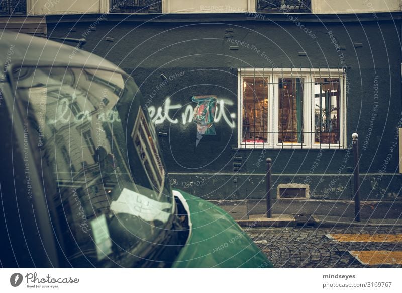 Rainy street in Paris Tourism City Town Facade Window Zebra crossing Car Old Discover Uniqueness Broken Wet Retro Green Black Loneliness Transience Graffiti