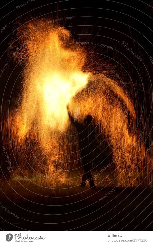 Playing with fire - Man in the midst of spark fire Fire Spark Human being Silhouette Hot Threat Magic Elements shower of sparks magic Uniqueness Fire show Shows