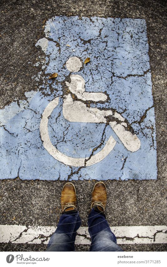 Disabled sign on the asphalt Medication Chair Human being Park Places Transport Street Car Stripe Blue White Safety invalid signal care Priority Parking painted