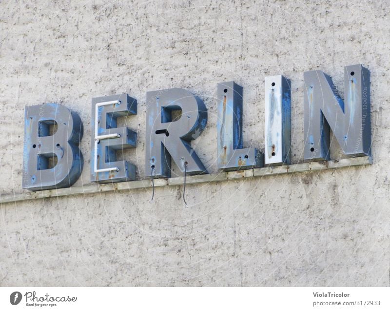 Lettering "Berlin", old blue neon sign Tourism City trip Town Capital city Downtown Manmade structures Building Architecture Wall (barrier) Wall (building)