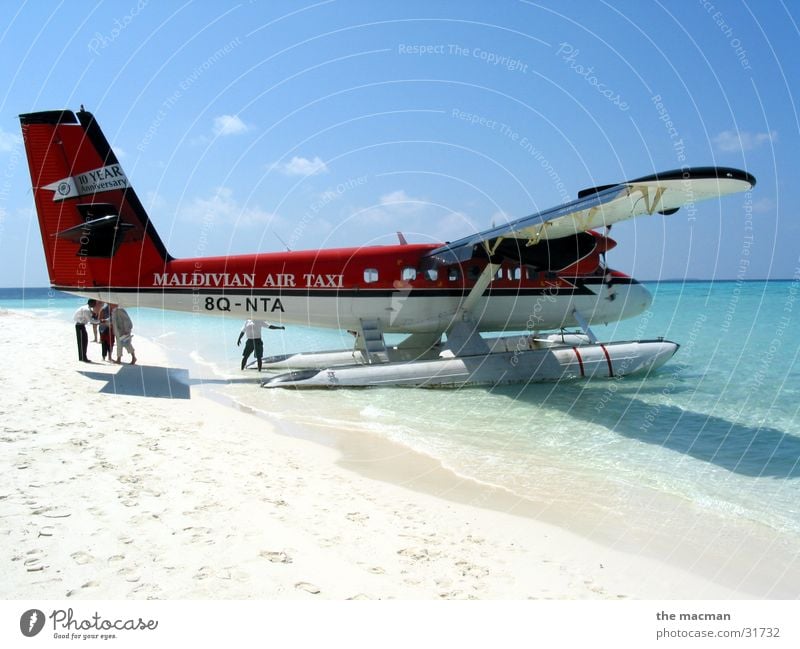 Seaplane at Fesdu Adventure Vacation & Travel Maldives Ocean Relaxation Flying dream vacation Island