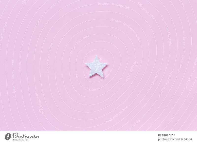 White Christmas Star On A Light Pink Background A Royalty Free